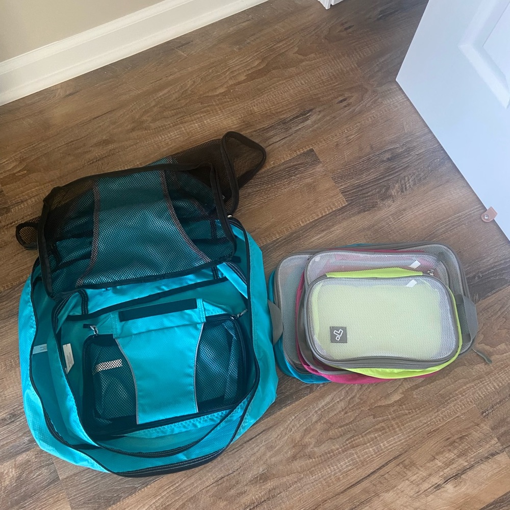 6 packing cubes/bags for travel.  Great shape.